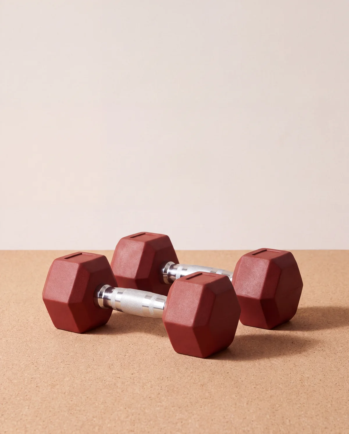 Rubber hex dumbbell pair, 25 lb each